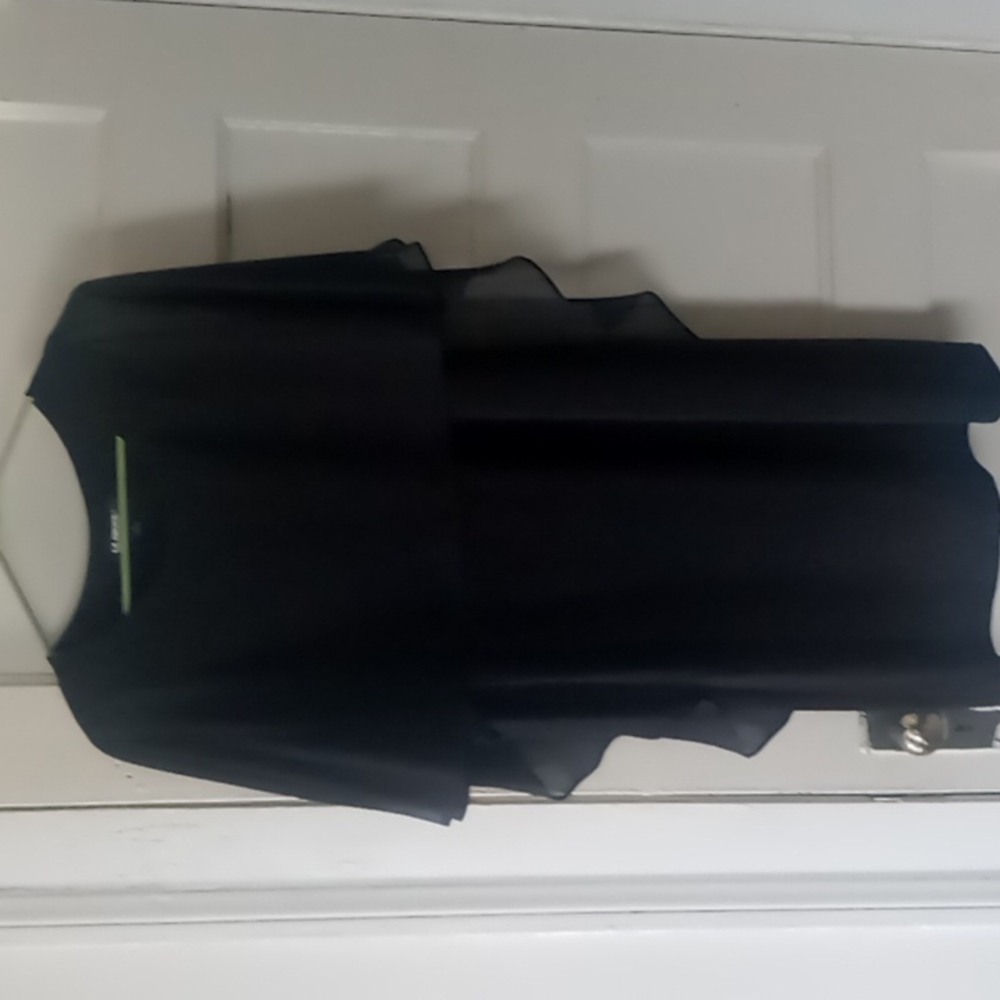 Black dress with attached sheer overlay